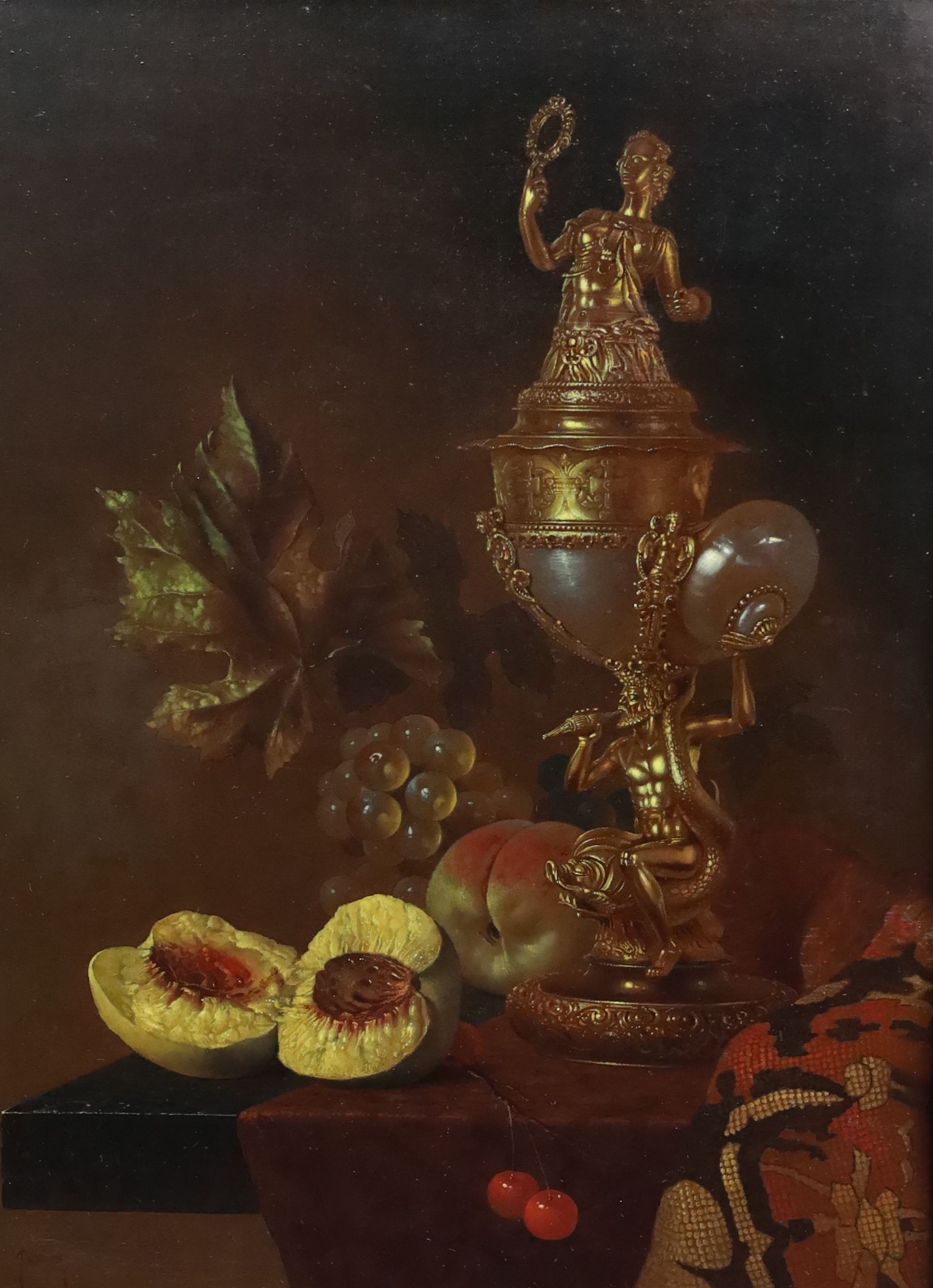 Gyula Bubarnik (Hungarian, 1936-2010), 17th century style still life of a silver gilt nautilus cup and fruit upon a table top, oil on panel, 40 x 30cm